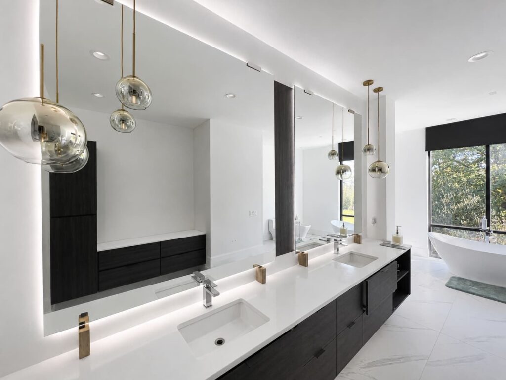 Large custom wall mirror installation
